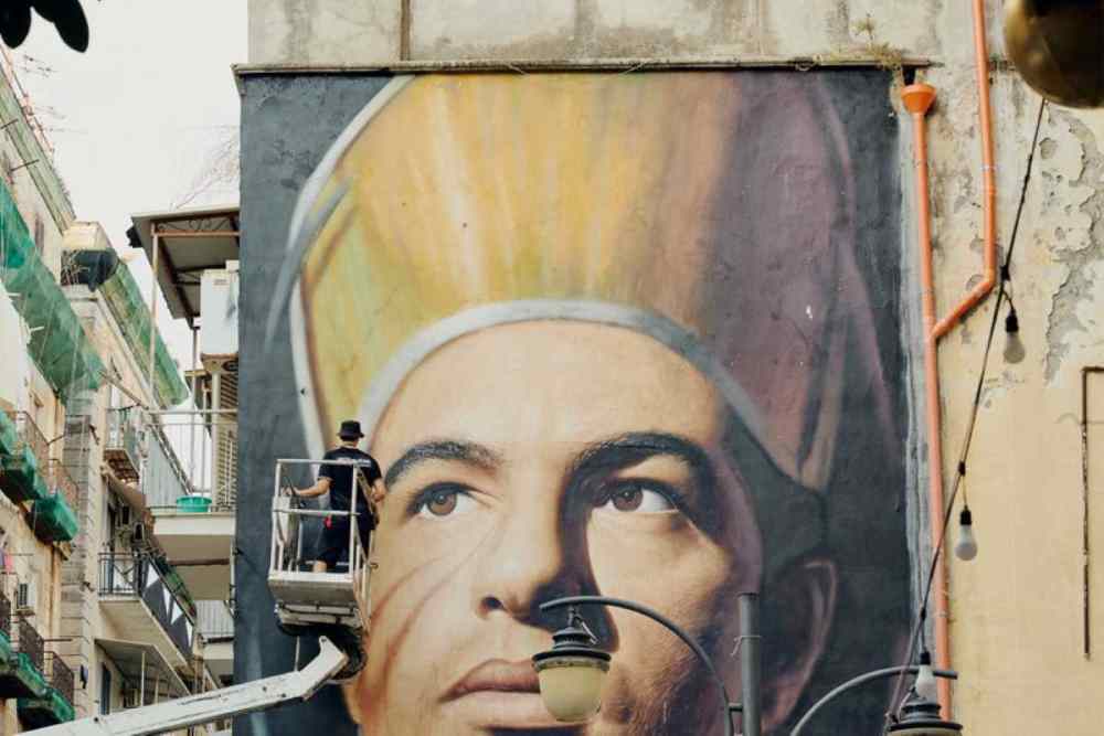 Napoli, il murale di San Gennaro di Jorit torna a brillare per il decennale di Gcds